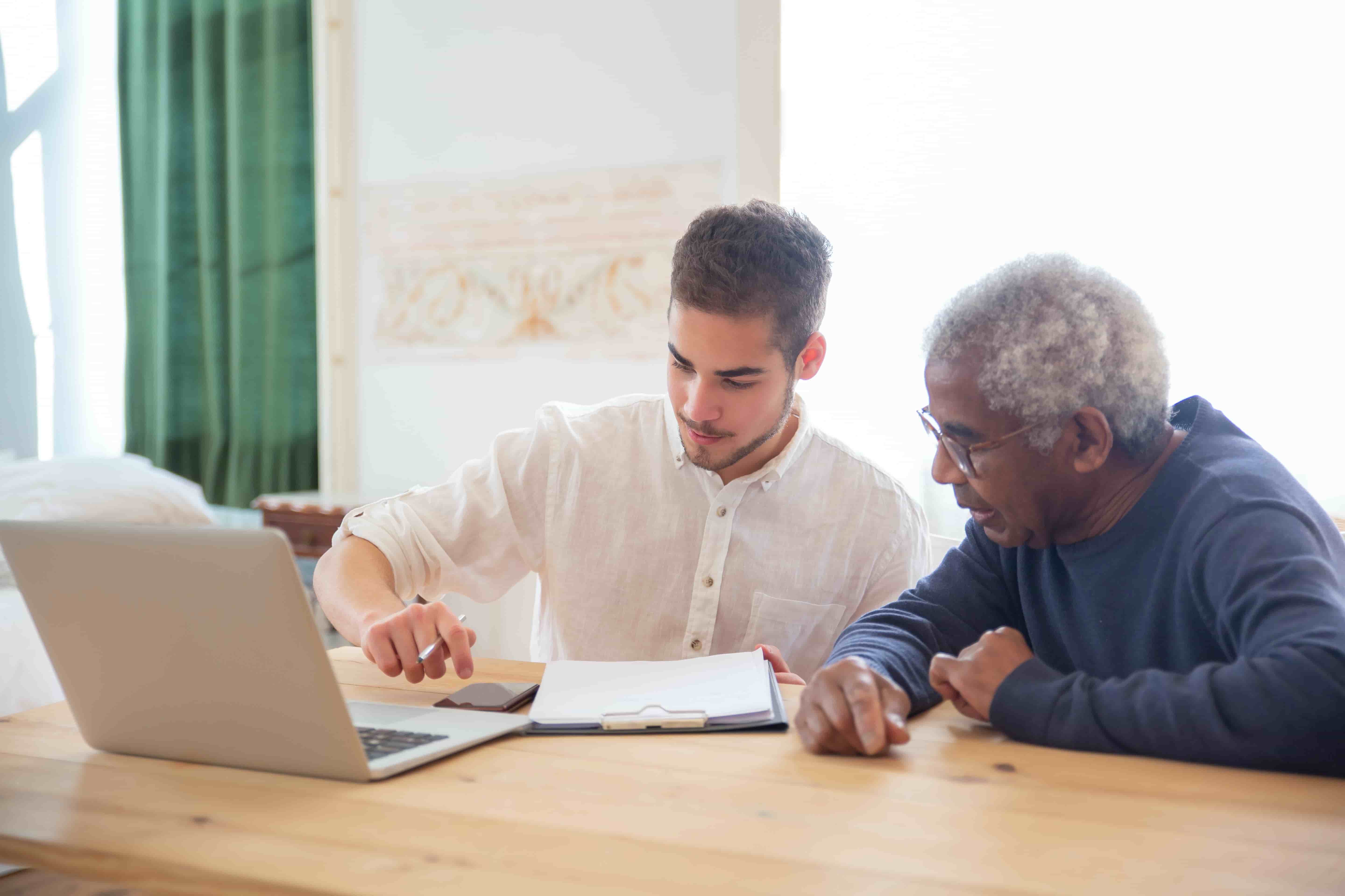 An elderly man with a doctor